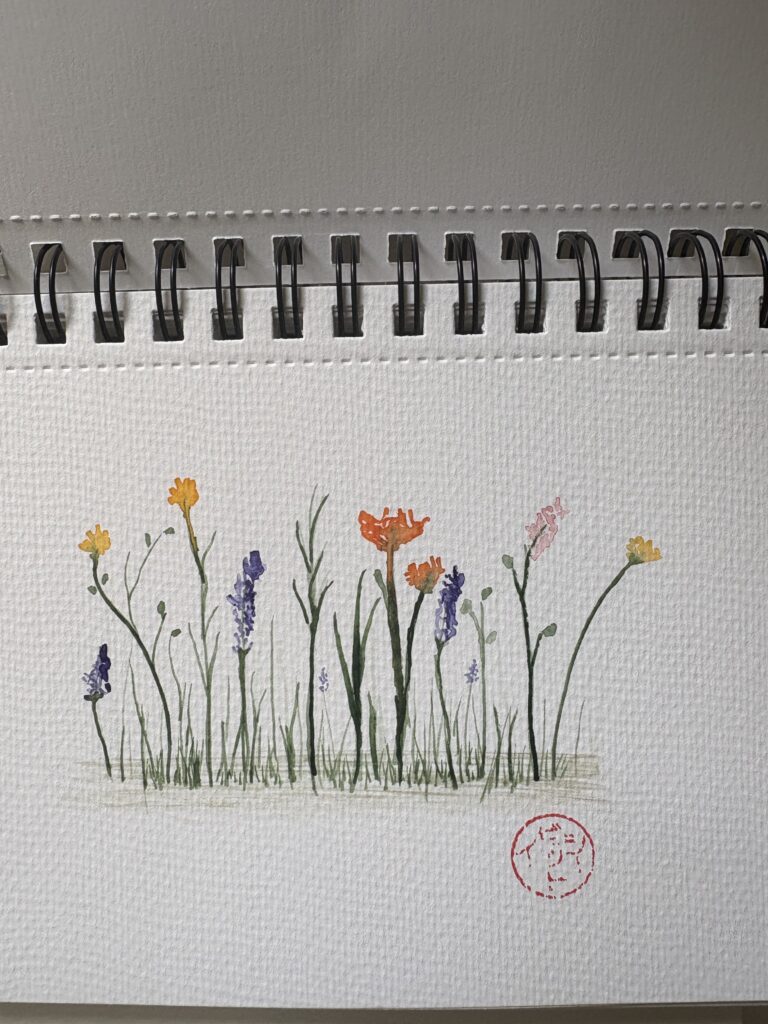 Watercolor sketch of slender green stems and small wildflowers in orange, yellow, purple, and pale pink, with a red circular artist stamp on textured paper — ACFA Creative House